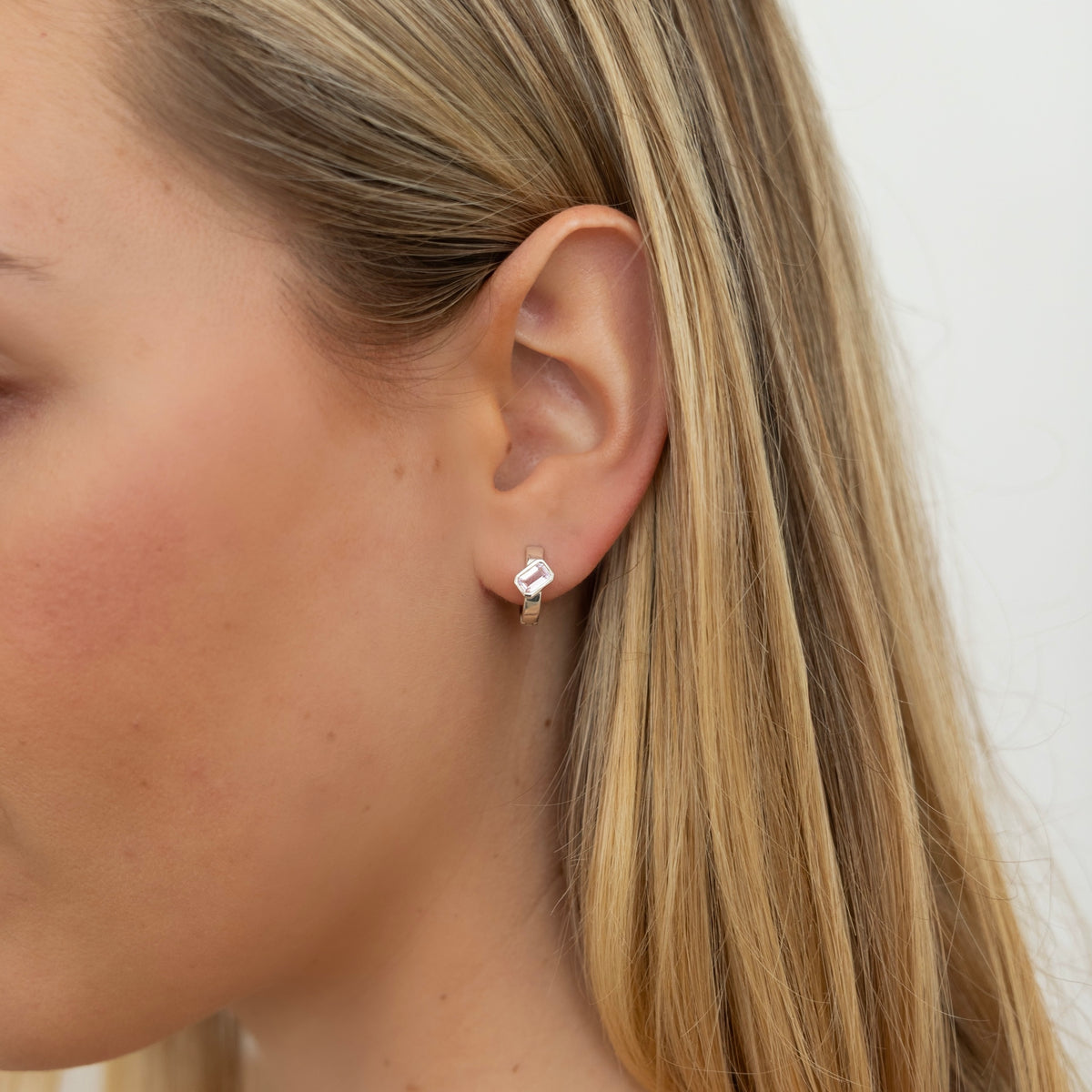 Emerald Cut Huggies Earrings | White Sapphire