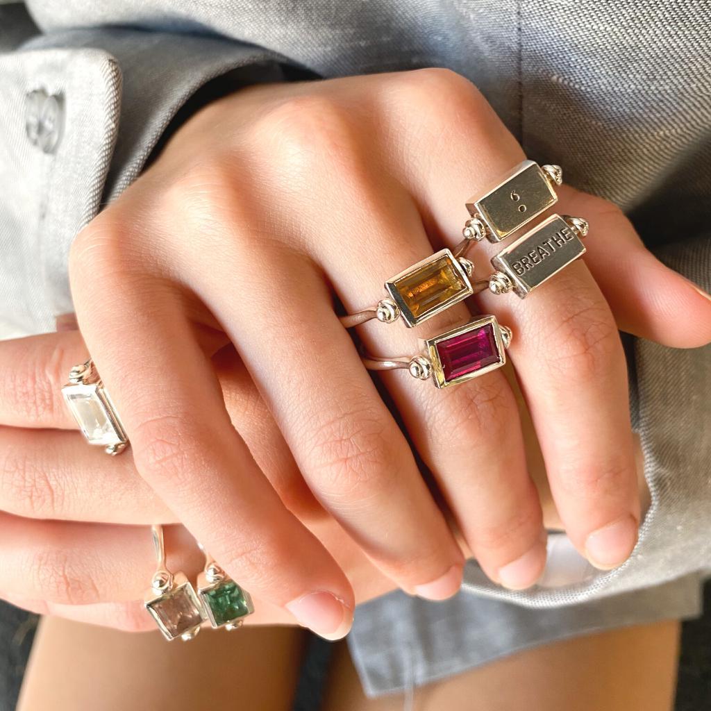 Emerald Cut Swivel Ring - White Sapphire