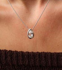 FLOAT™️ - Pear Cut Pendant - Sterling Silver & White Sapphire