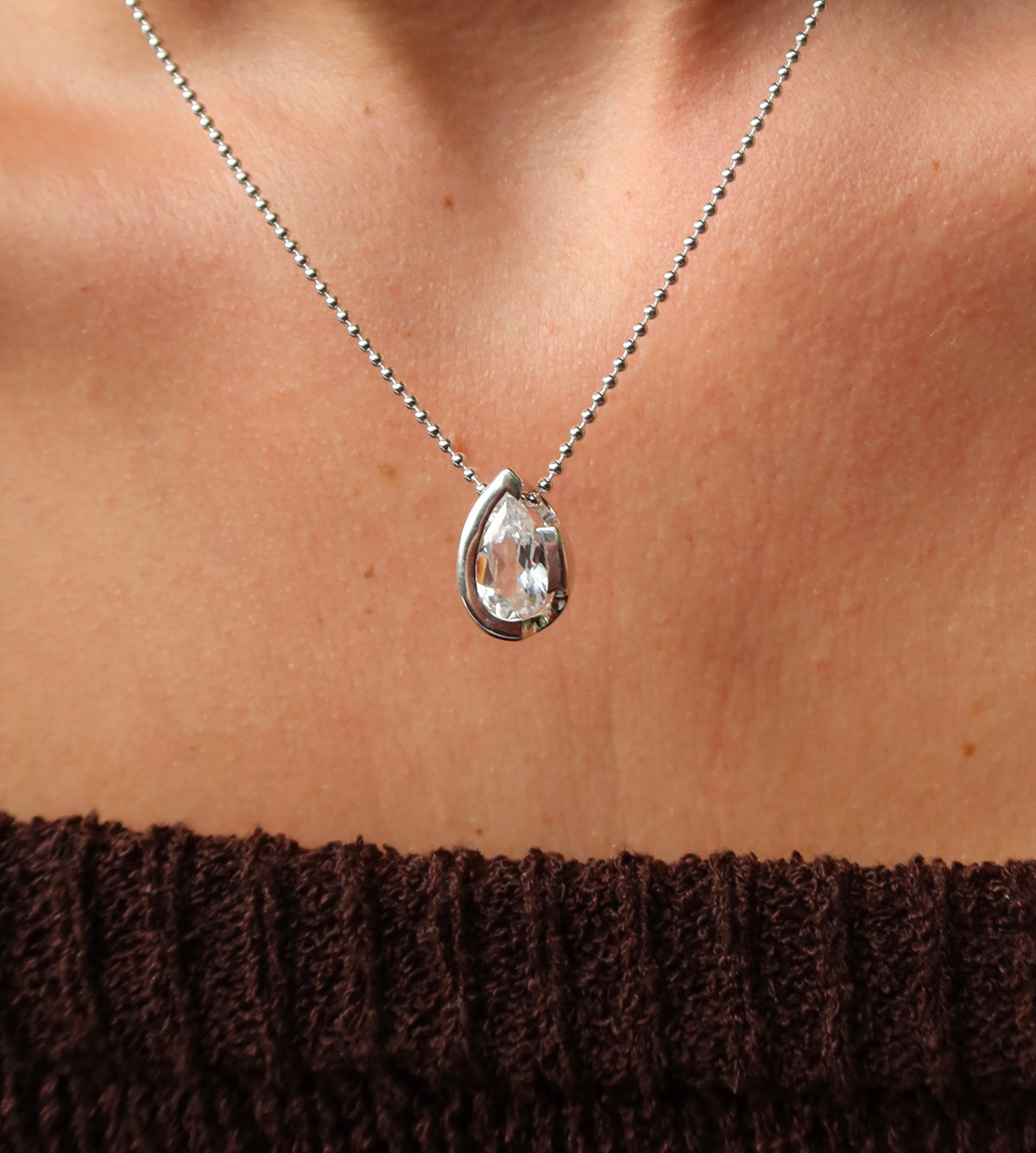 FLOAT™️ - Pear Cut Pendant - Sterling Silver & White Sapphire