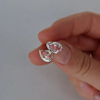 FLOAT™️ - Pear Cut Stud Earrings - Sterling Silver & Rosie Corundum