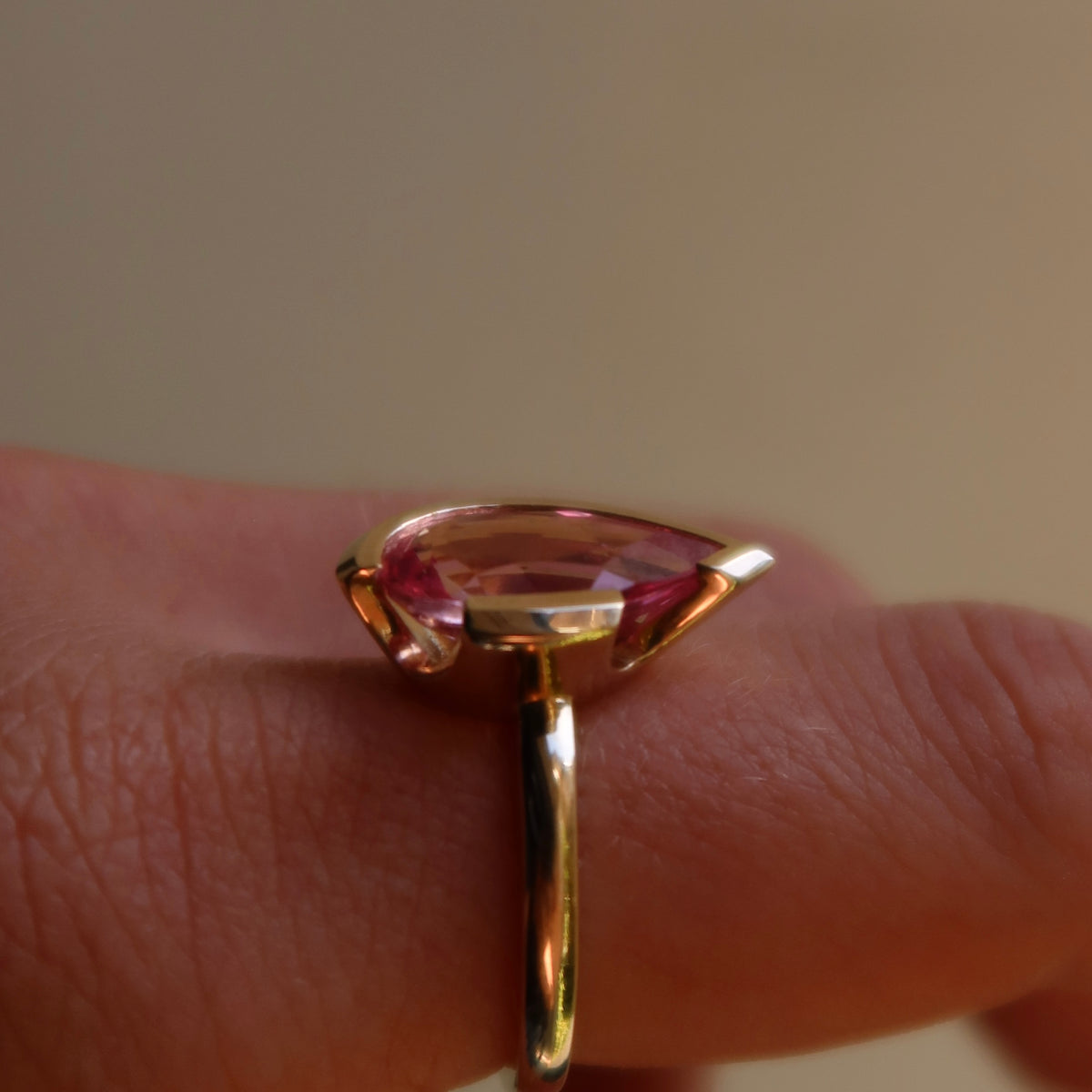 The FLOAT Pear-Cut Ring | 9ct Yellow Gold - Rosie Corundum | Size Q